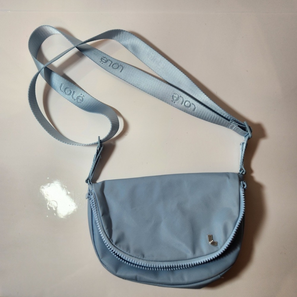 Lole Light Blue Nylon Curved Crossbody Bag Adjustable Logo Strap Travel Purse